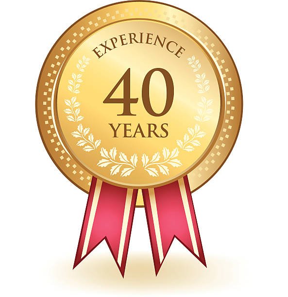 Medalha dourada com a inscrição 40 anos de experiência